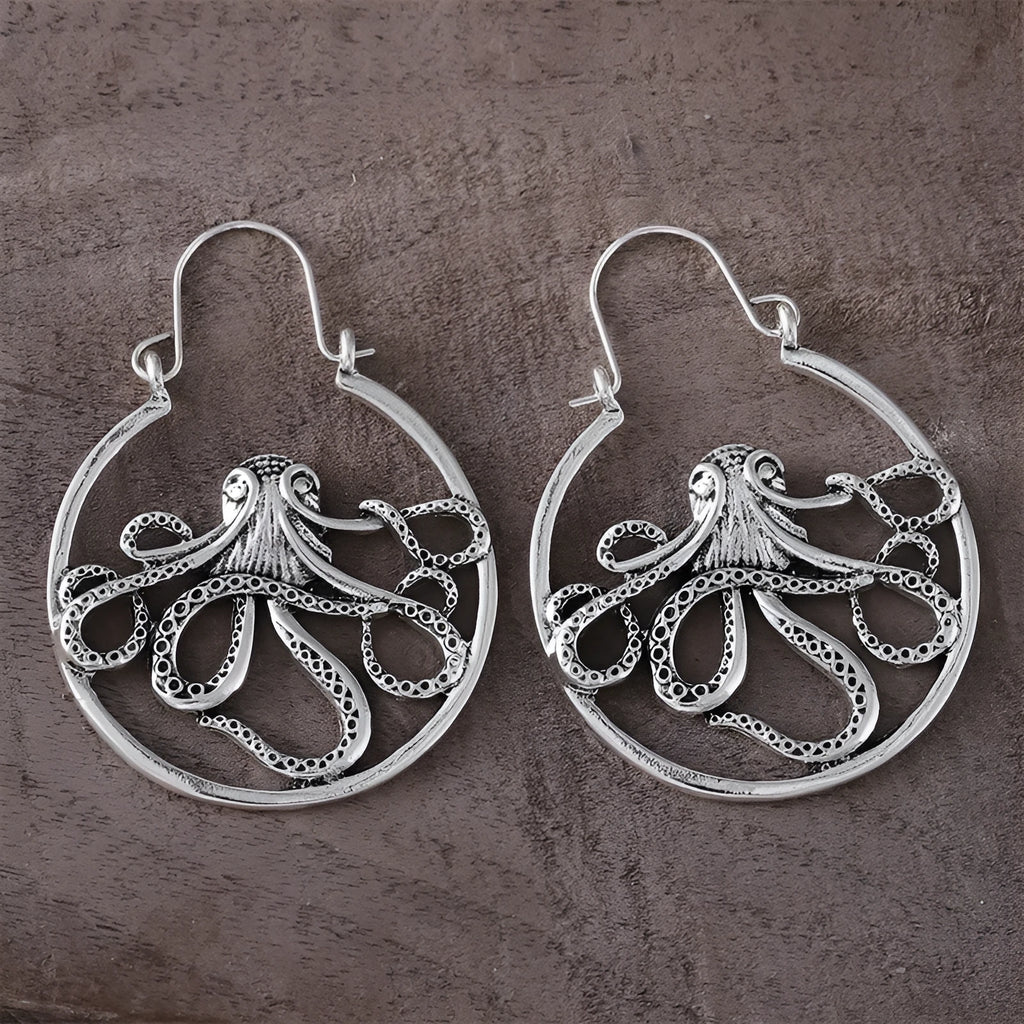 Vintage antique silver octopus earrings with detailed tentacles, retro animal zodiac design.