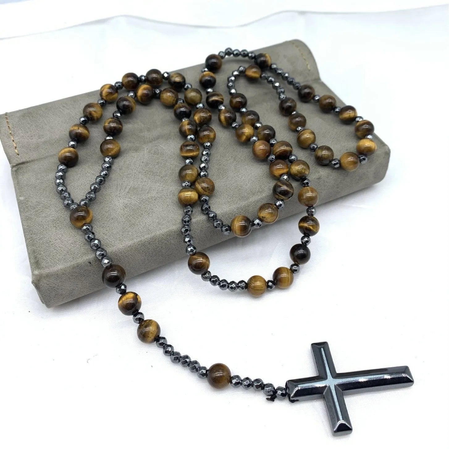Men's cross pendant necklace with hand-woven stone geometric design on ball bead chain