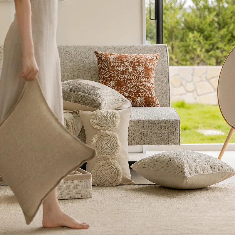 Coreless red brown and solid colour sofa cushion with PP cotton filler on a living room sofa.