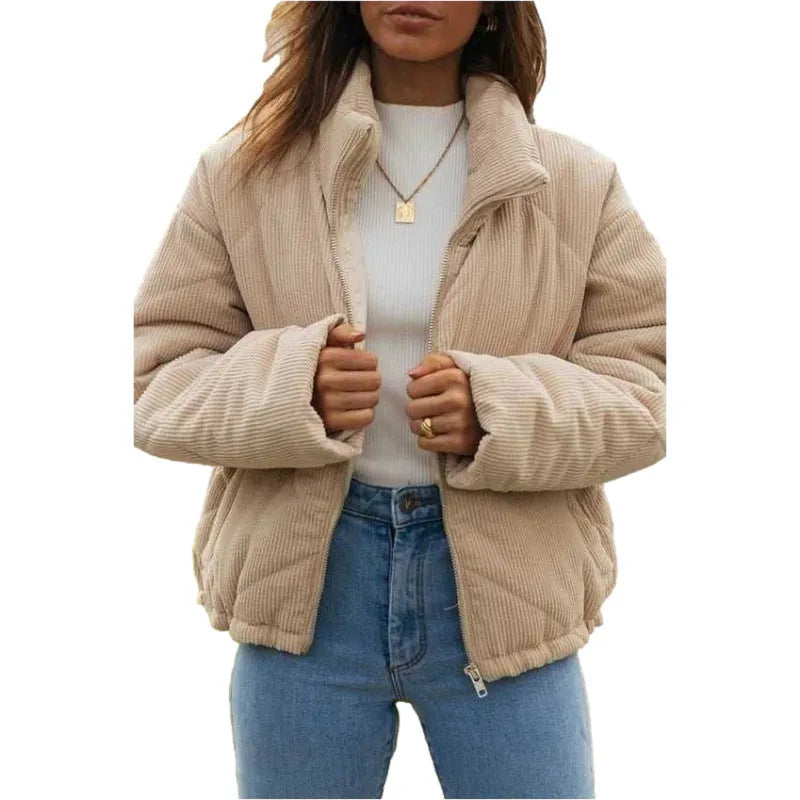 Apricot coloured women's corduroy jacket with stand collar, front zipper, and long sleeves.