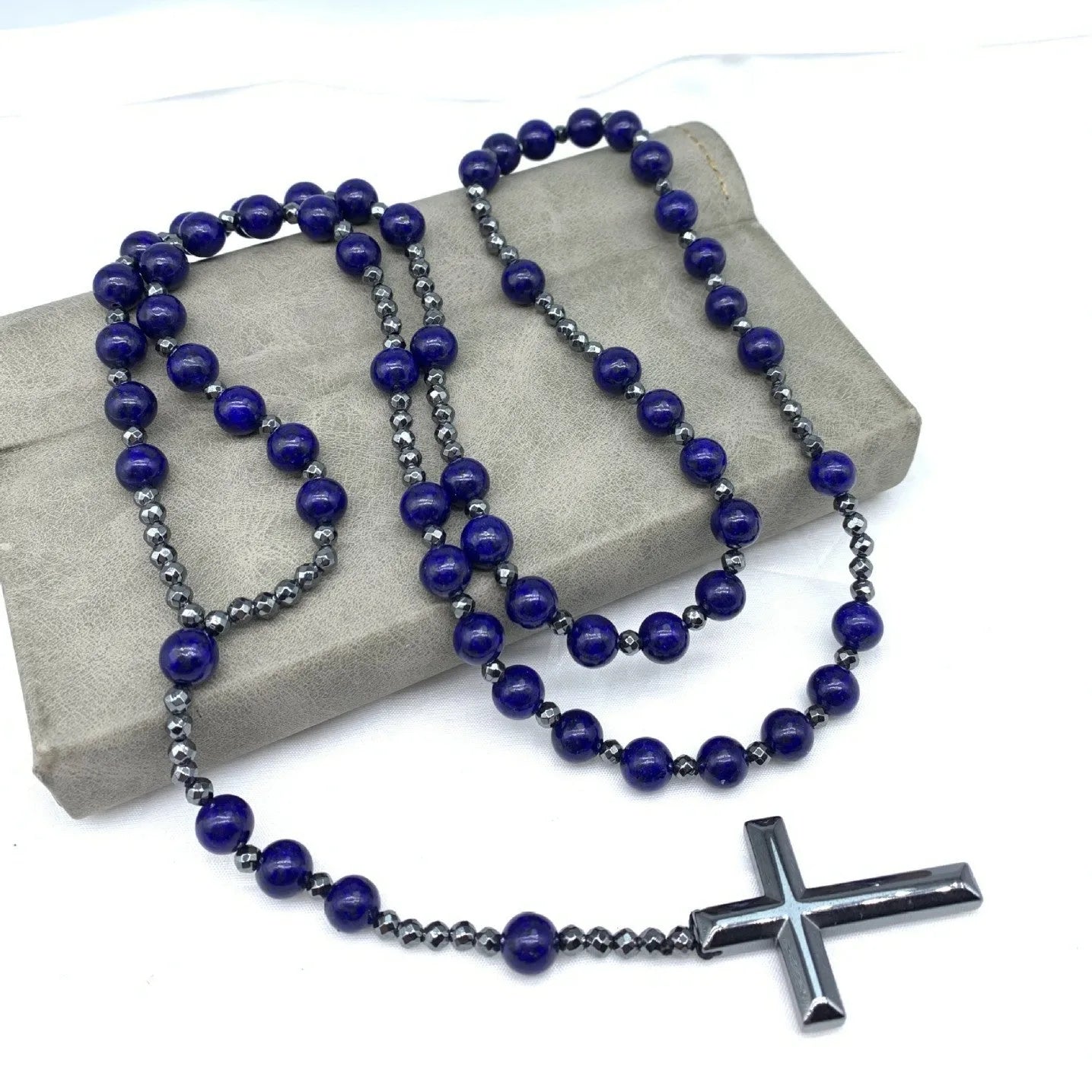 Men's cross pendant necklace with hand-woven stone geometric design on ball bead chain