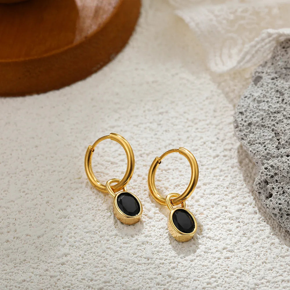 Women's retro-style oval zircon earrings in copper, shown in six colour options on a white background.