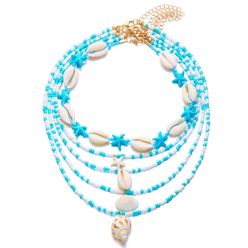 Blue shell and starfish pendant necklace set with five pieces on 21-50cm chains