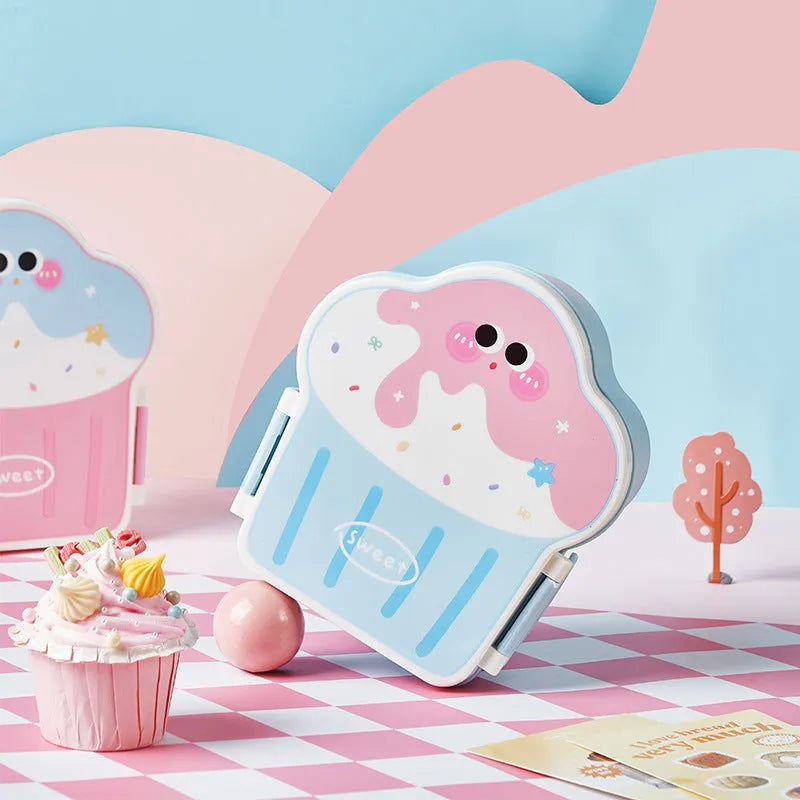 Plastic ice cream shaped lunch box in pink or blue with spoon and fork for students