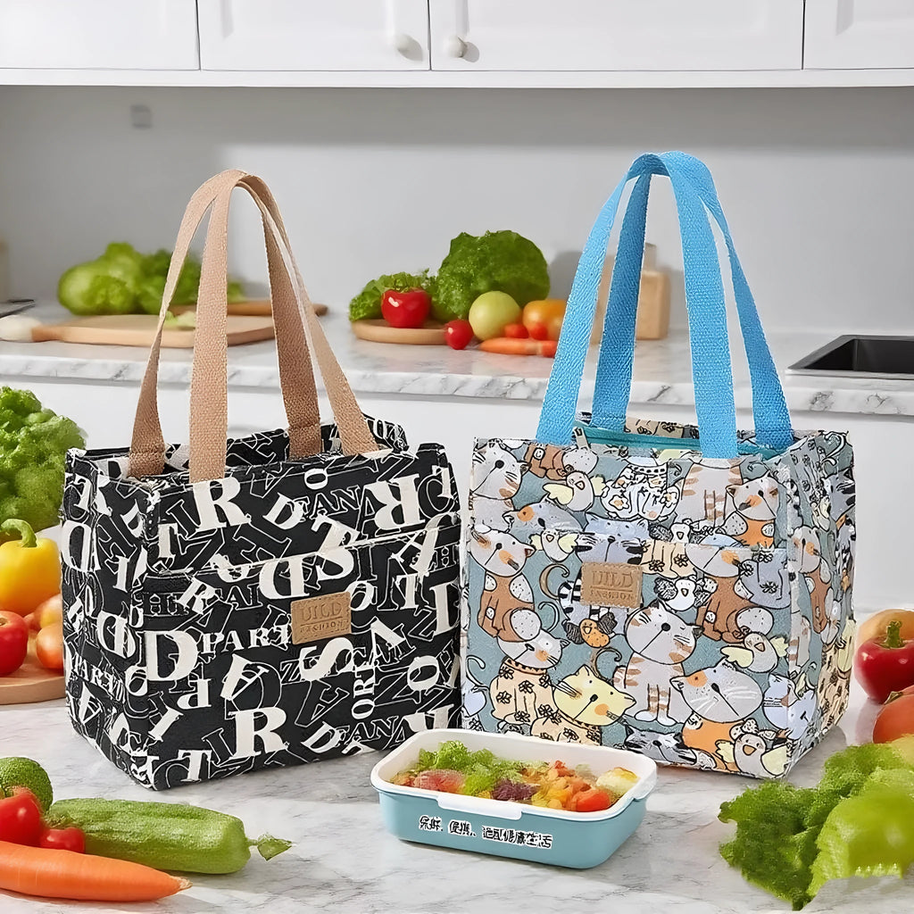 Women's printed canvas handbag with aluminium frame in multiple floral and animal print designs