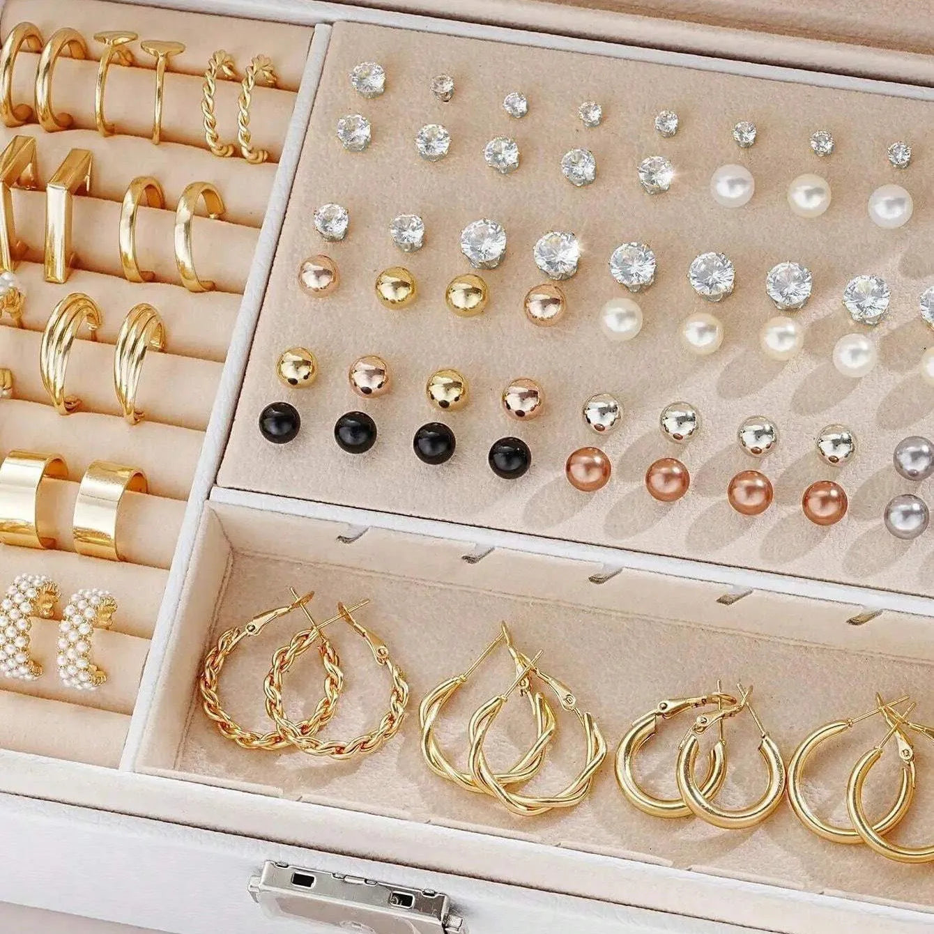 108 geometric pearl earrings in gold and yellow colours with round elements on alloy studs