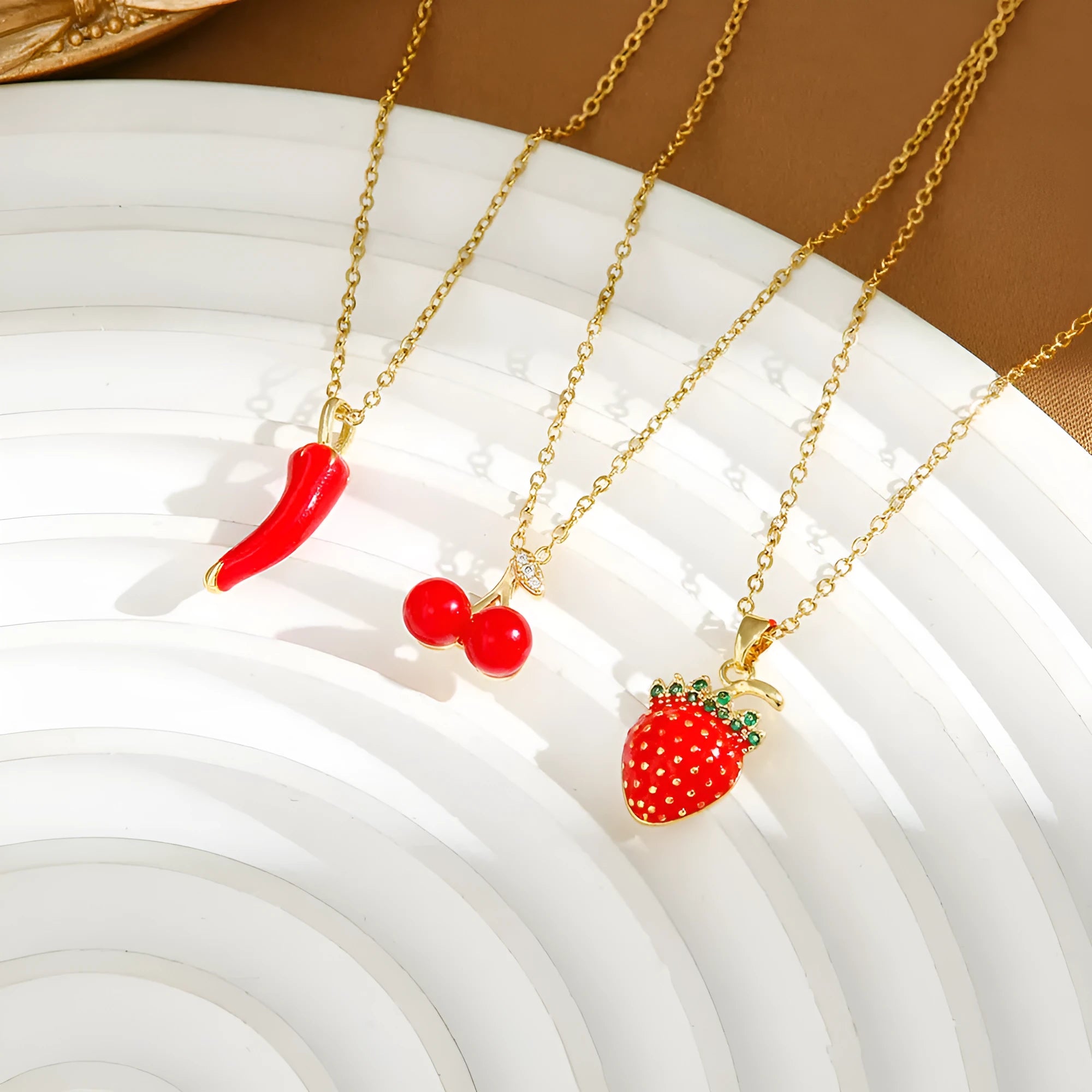 Golden pepper pendant necklace on O-ring chain with titanium steel construction