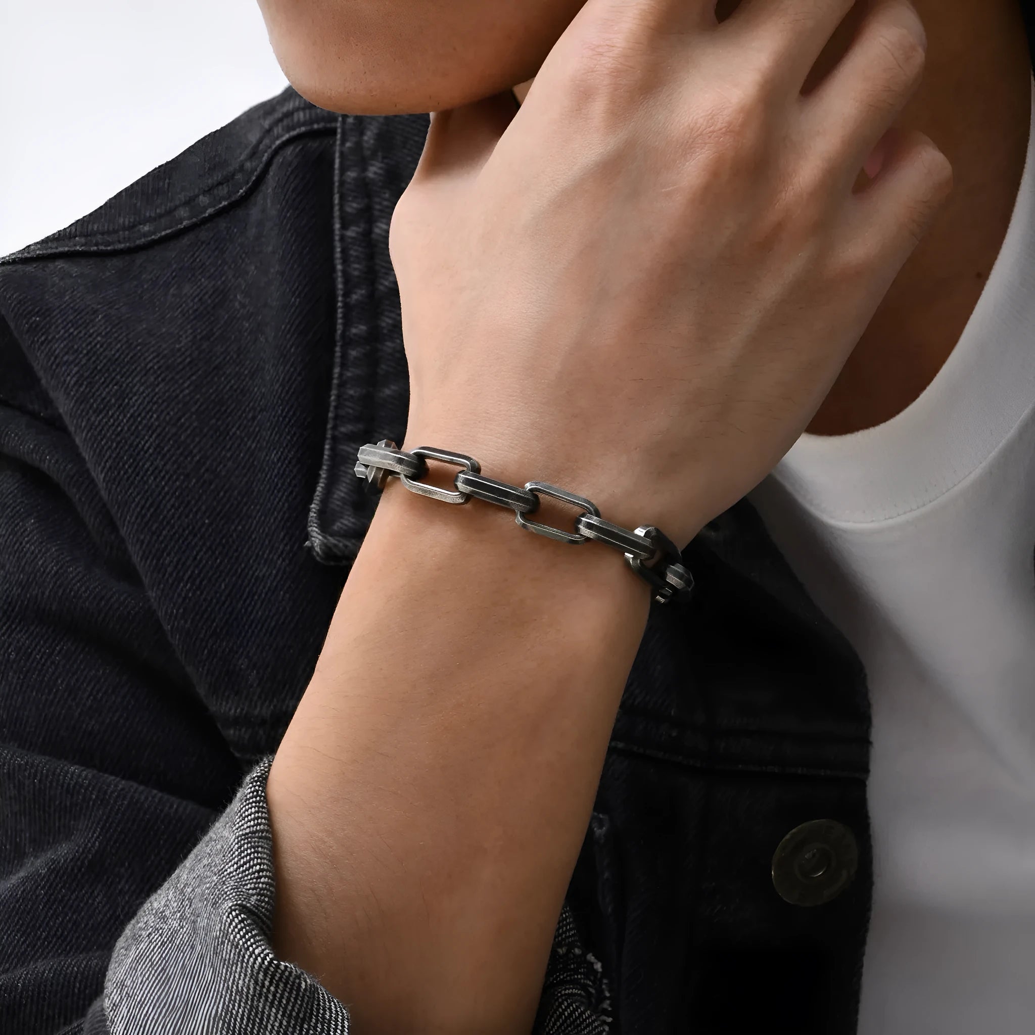 Men's simple square chain titanium steel bracelet in gold finish with clasp.