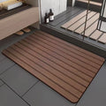 American style square diatom ooze floor mat with wood grain geometric pattern, shown in a bathroom setting.
