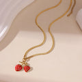 Red strawberry fruit pendant necklace on adjustable stainless steel chain