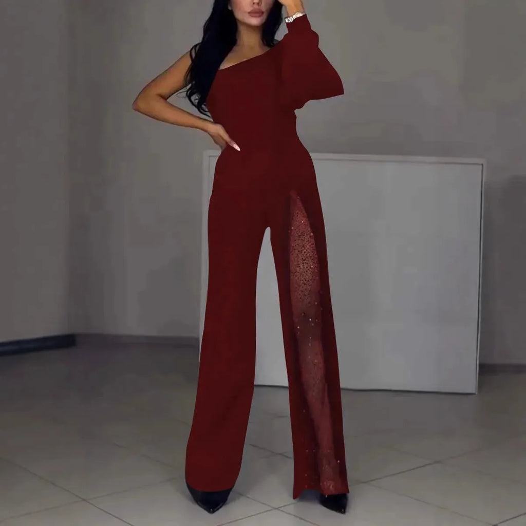 Black women's long sleeve jumpsuit with an oblique shoulder neckline and a high leg slit