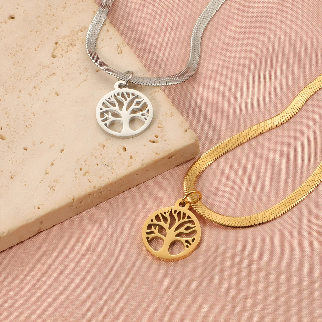 Stainless steel necklace with tree pendant on adjustable snake chain in gold and steel colours.