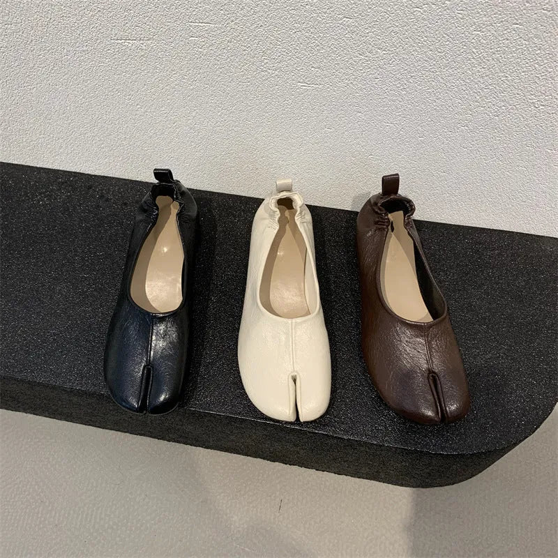 Women's round toe chunky heel pumps in apricot with a split toe horseshoe design and low heel.
