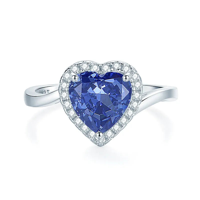 Heart-shaped high carbon diamond-cut ice flower zircon stone in a women's 925 sterling silver ring.