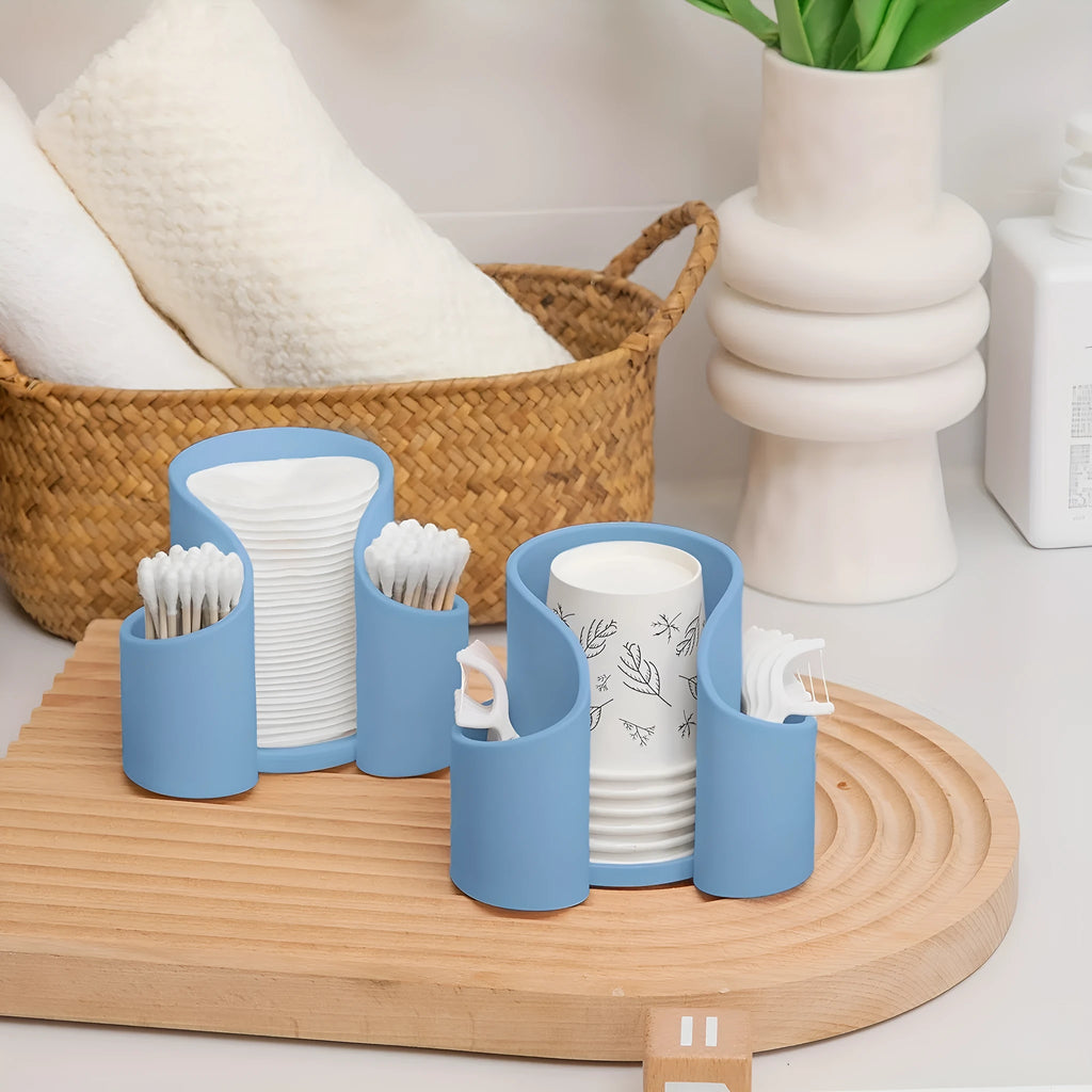 Modern solid-colour plastic box for storing dental floss and cotton swabs.