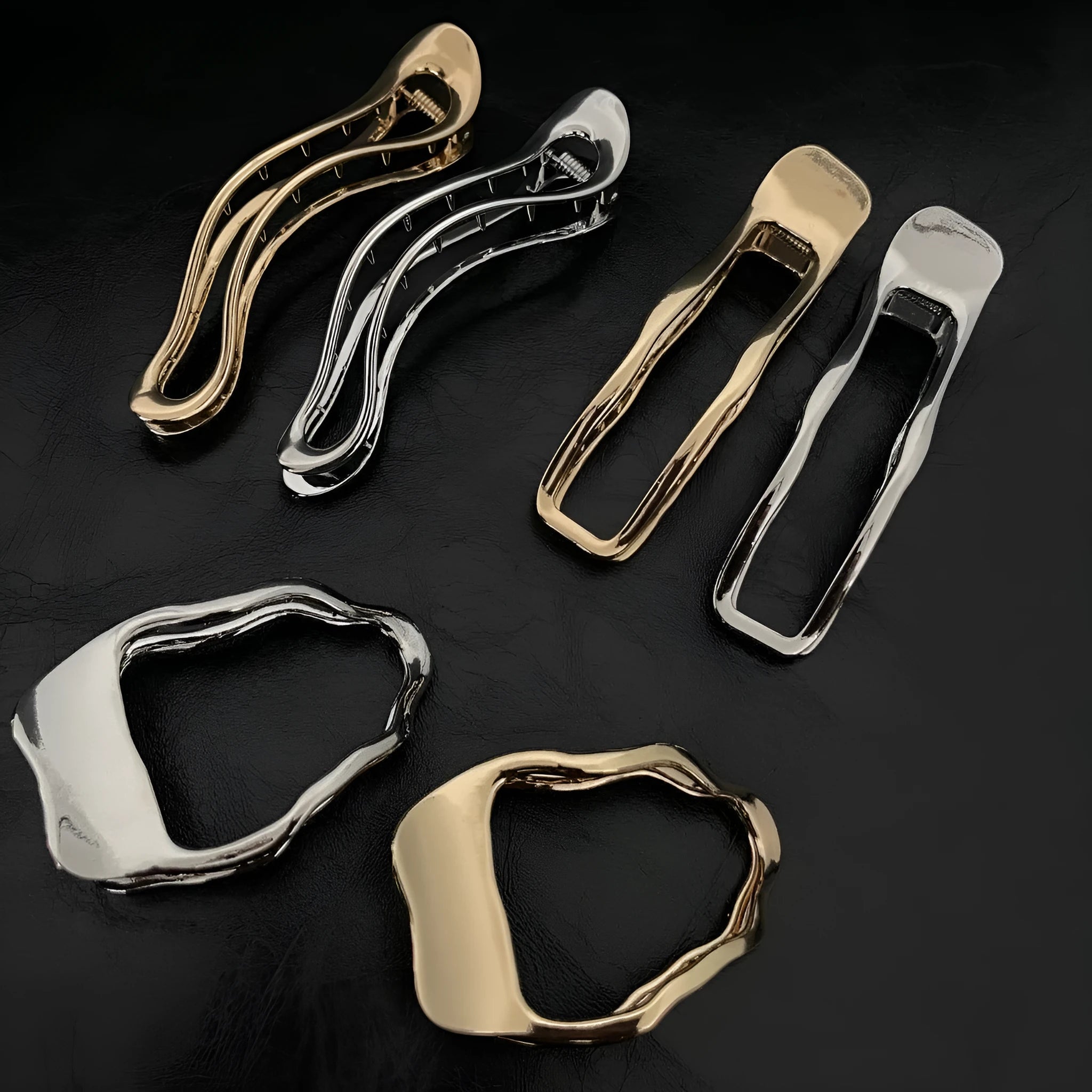 Gold and silver zinc alloy women's hair barrettes in arc, square, and triangle shapes.