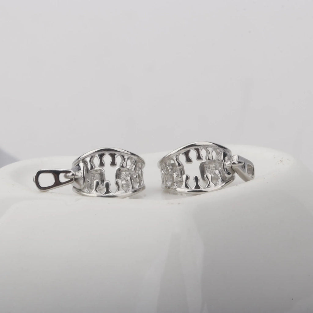 Copper geometric ear clips with zipper design detail in ES862 colour showing bone clip fastening