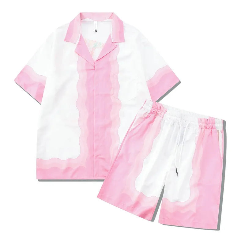 Men's plaid print beach outfit set with short sleeve shirt and pants on a hanger.