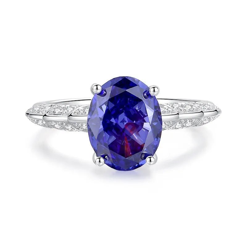 Heart-shaped high carbon diamond-cut ice flower zircon stone in a women's 925 sterling silver ring.