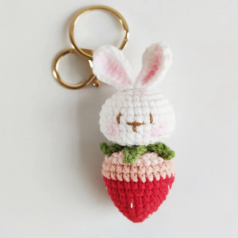 Hand-woven rabbit pendant with strawberry pattern made from four-strand wire with key attachment