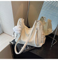 Women's soft PU fashion backpack with pendant accessory in black, milky white, silver or blue colour