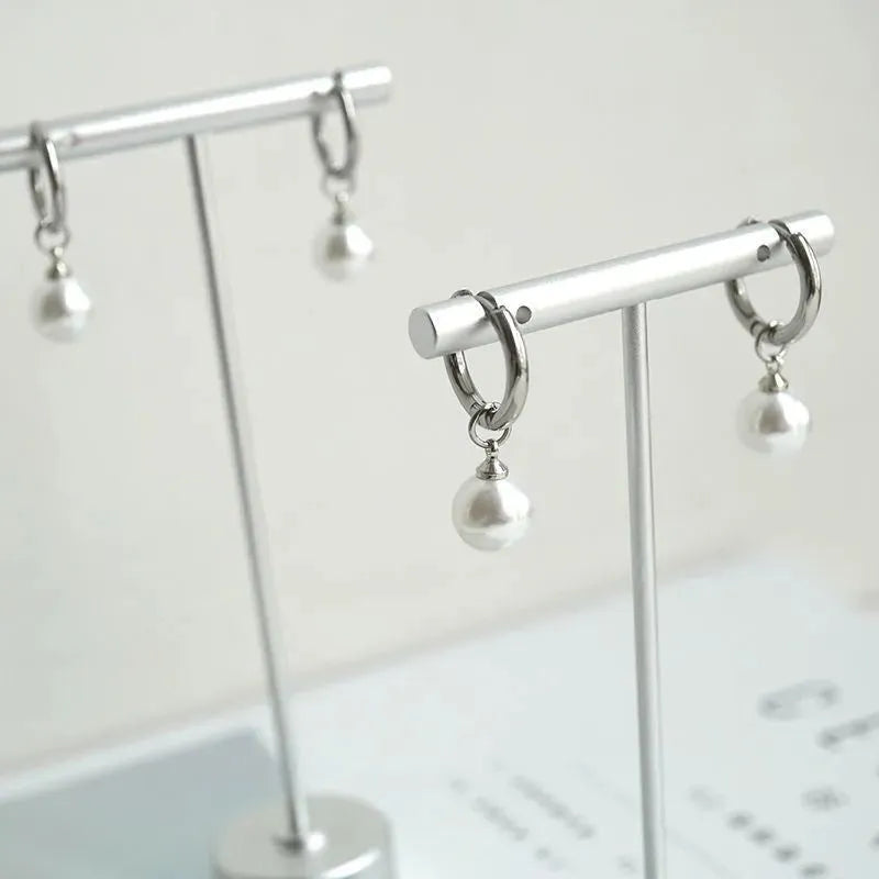 Geometric alloy pearl earrings with titanium steel posts and round pearl drops