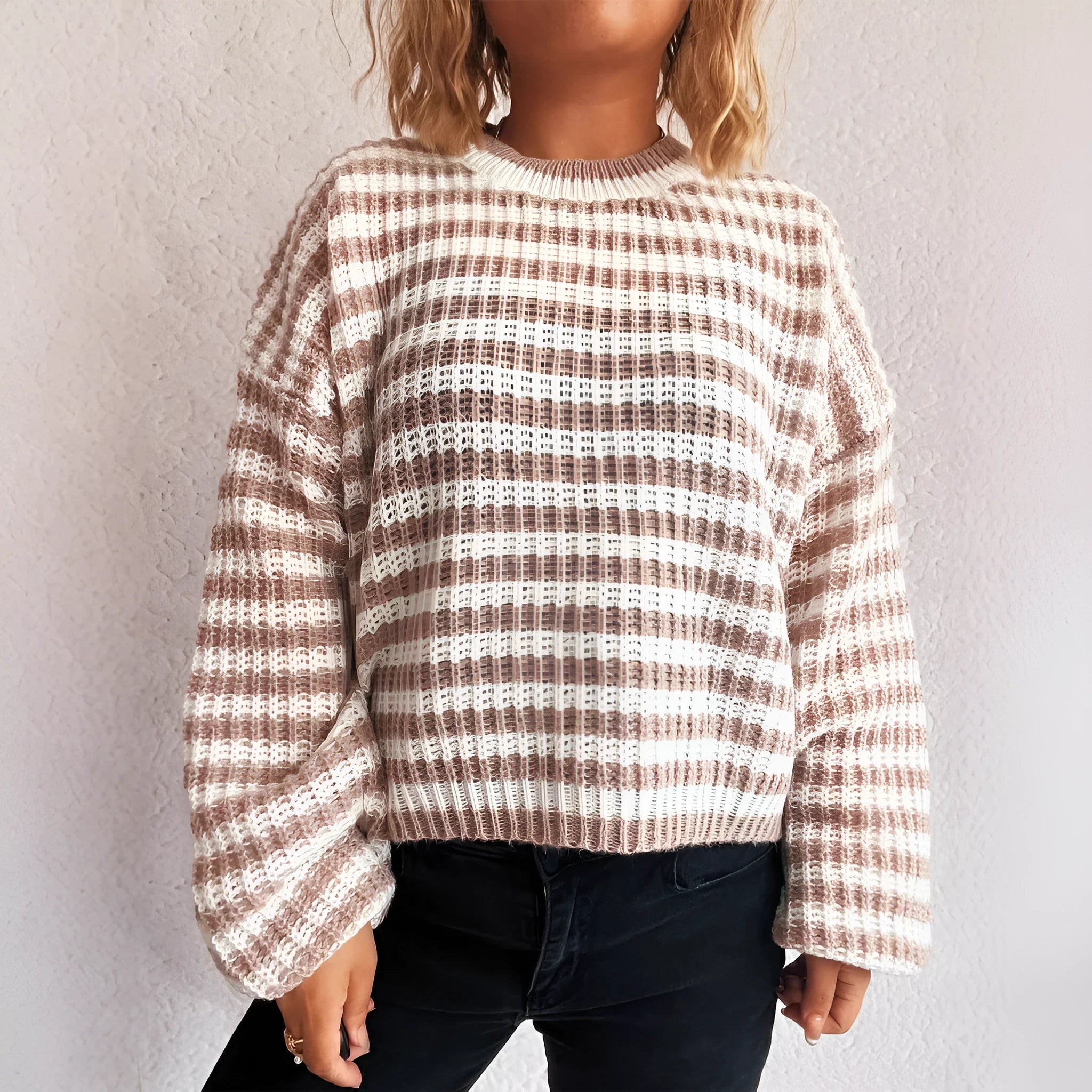 Women's vintage stripe knitted pullover sweater in loose fit, shown in a choice of colours.