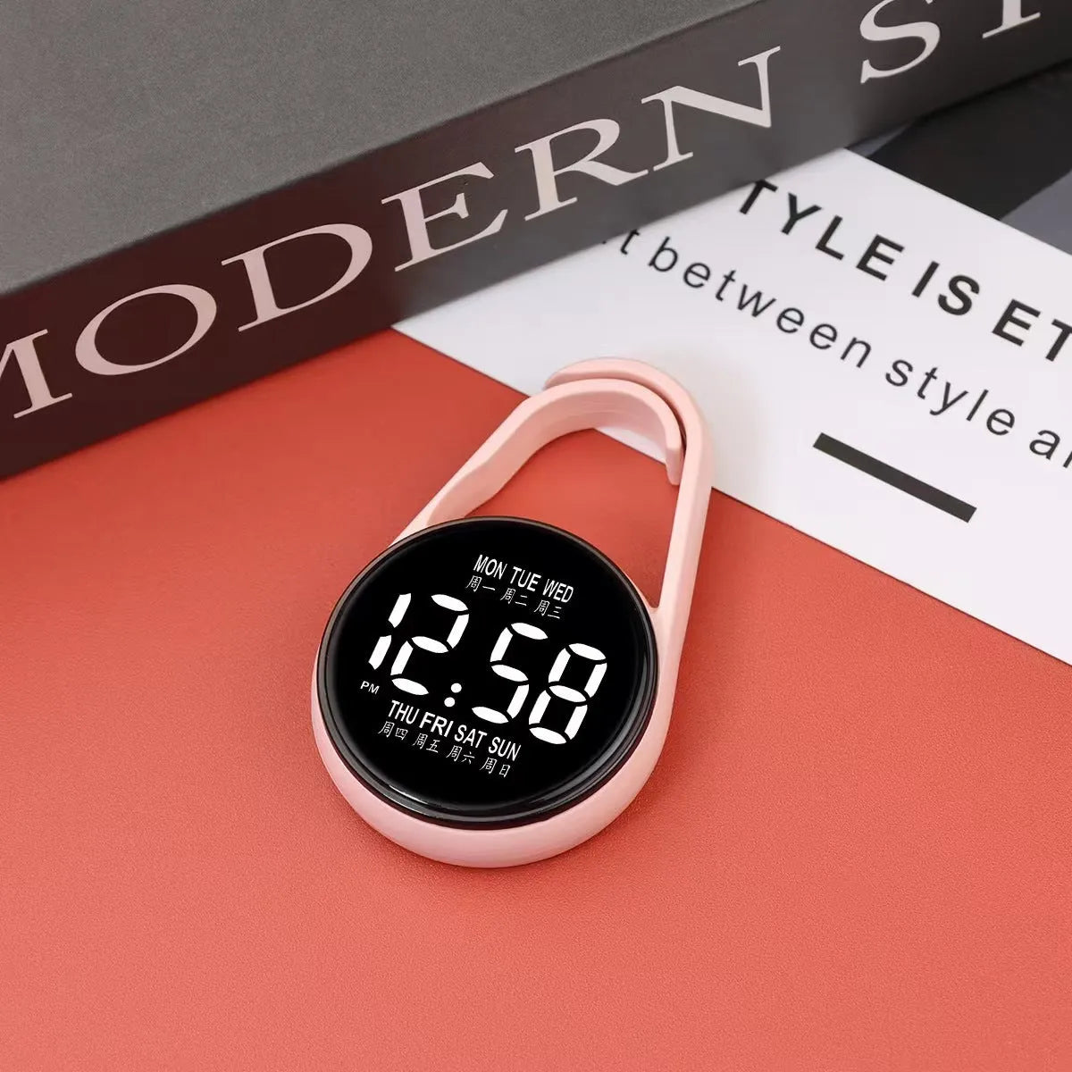 LED digital watch with week display on a plastic strap, shown in multiple colour options.