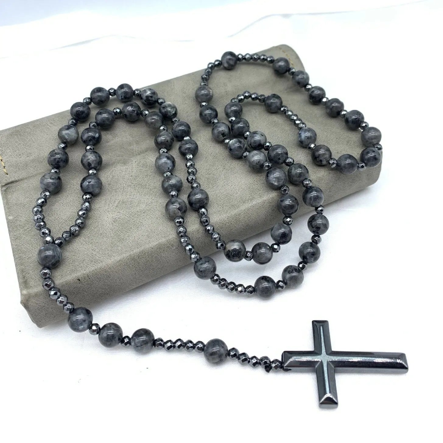 Men's cross pendant necklace with hand-woven stone geometric design on ball bead chain