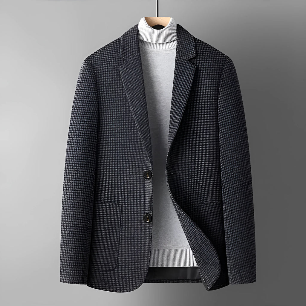 Men's slim fit wool suit jacket in grey on a hanger, showing notch lapel and button front.
