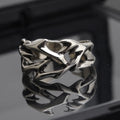 Copper geometric thorn flower ring with adjustable opening in J2150 thorns colour