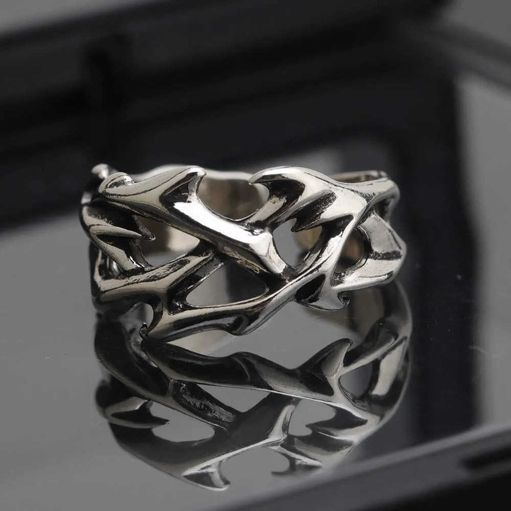 Copper geometric thorn flower ring with adjustable opening in J2150 thorns colour