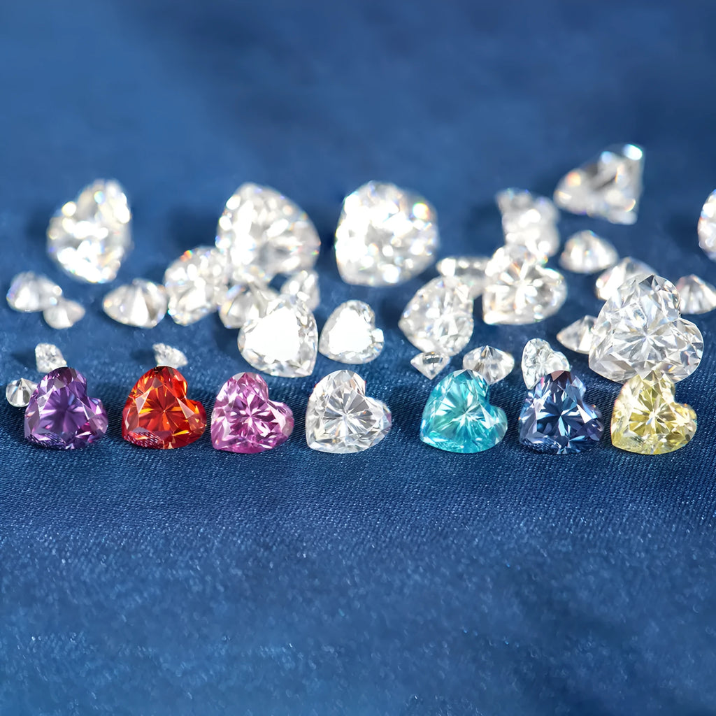 Colourful heart-shaped moissanite stone in lemon yellow, red, pink, blue and purple colours