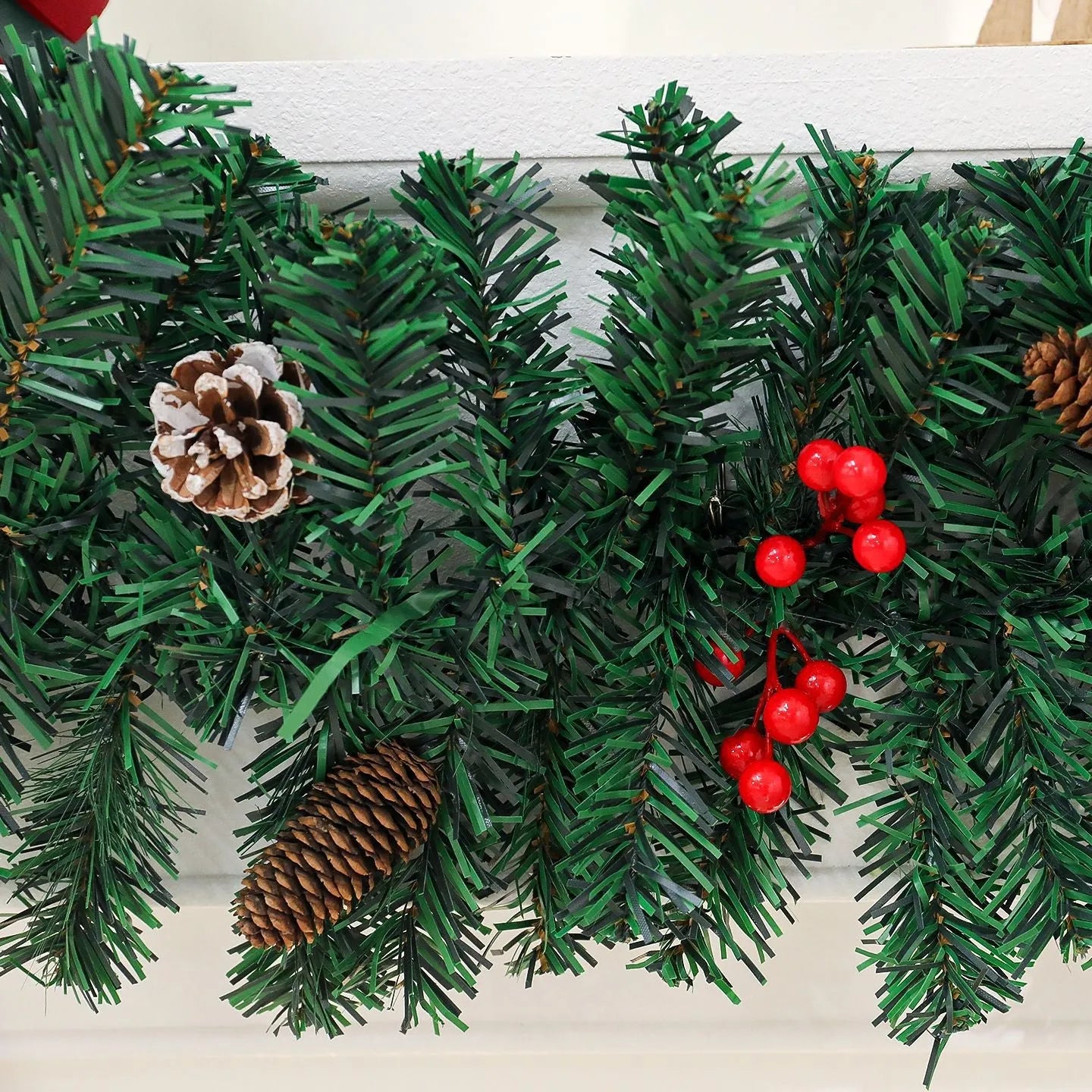 Christmas rattan decoration with pine cones and festive bow in European-style design