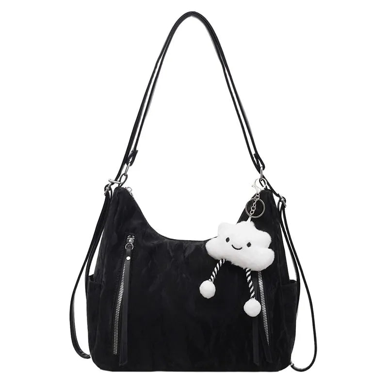 Women's soft PU fashion backpack with pendant accessory in black, milky white, silver or blue colour