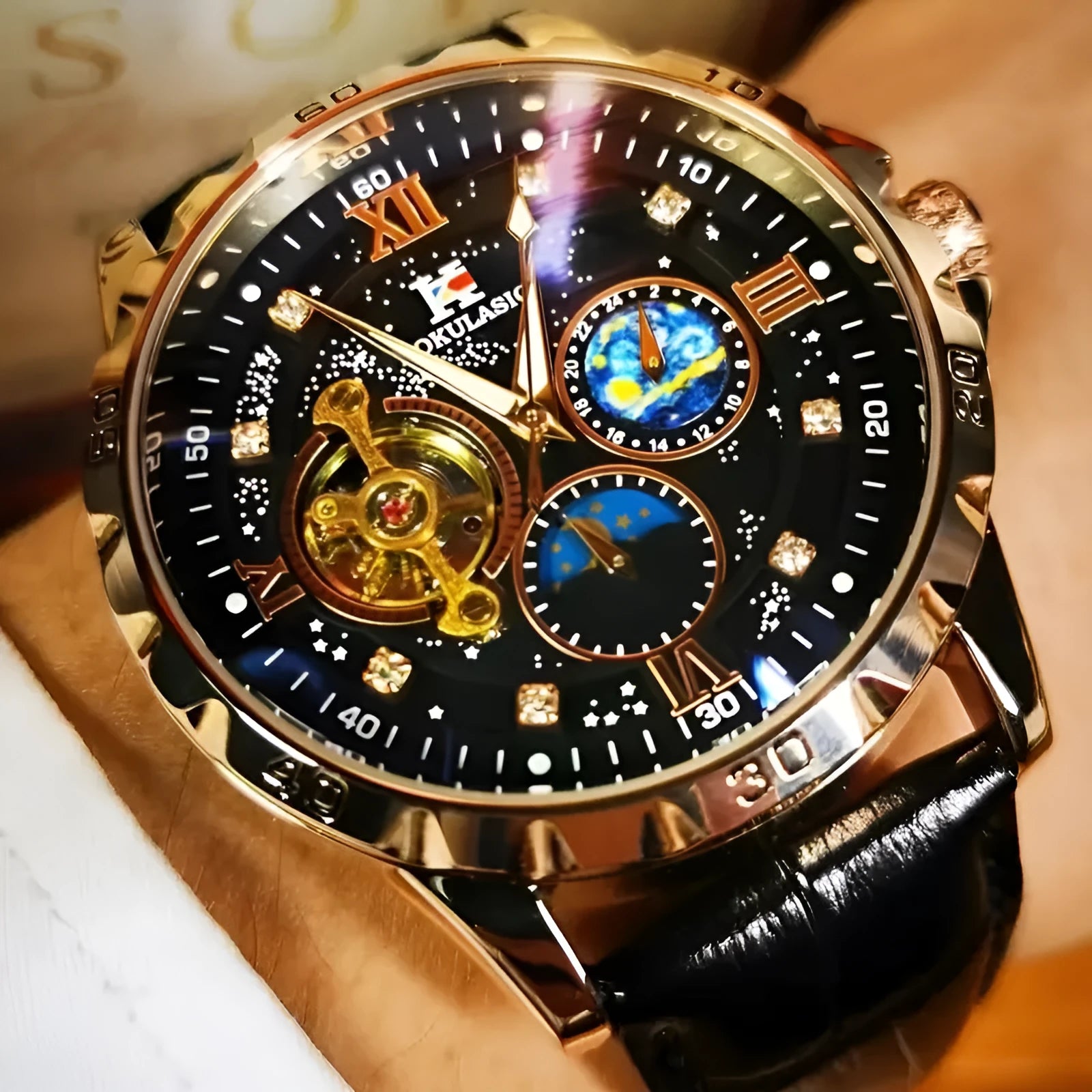 Men's automatic watch with black hollow dial, rose gold case, and leather strap