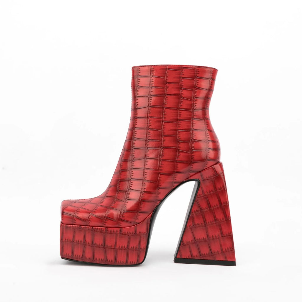 Women's brown ankle boot with a high heel above 8cm and an artificial PU upper