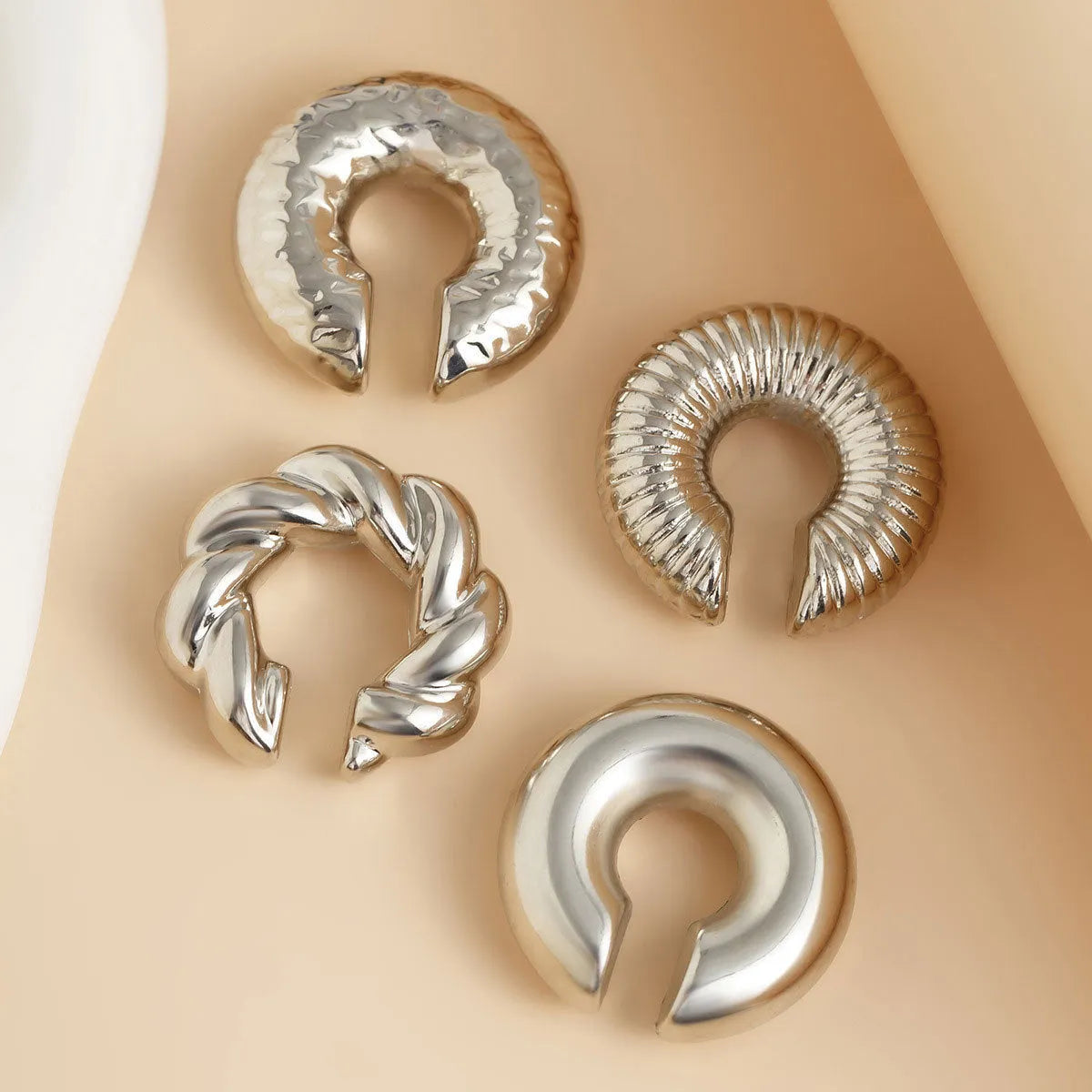 Geometric ear clip set for women in gold and silver colours with non-pierced design