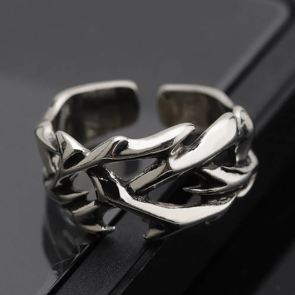 Copper geometric thorn flower ring with adjustable opening in J2150 thorns colour