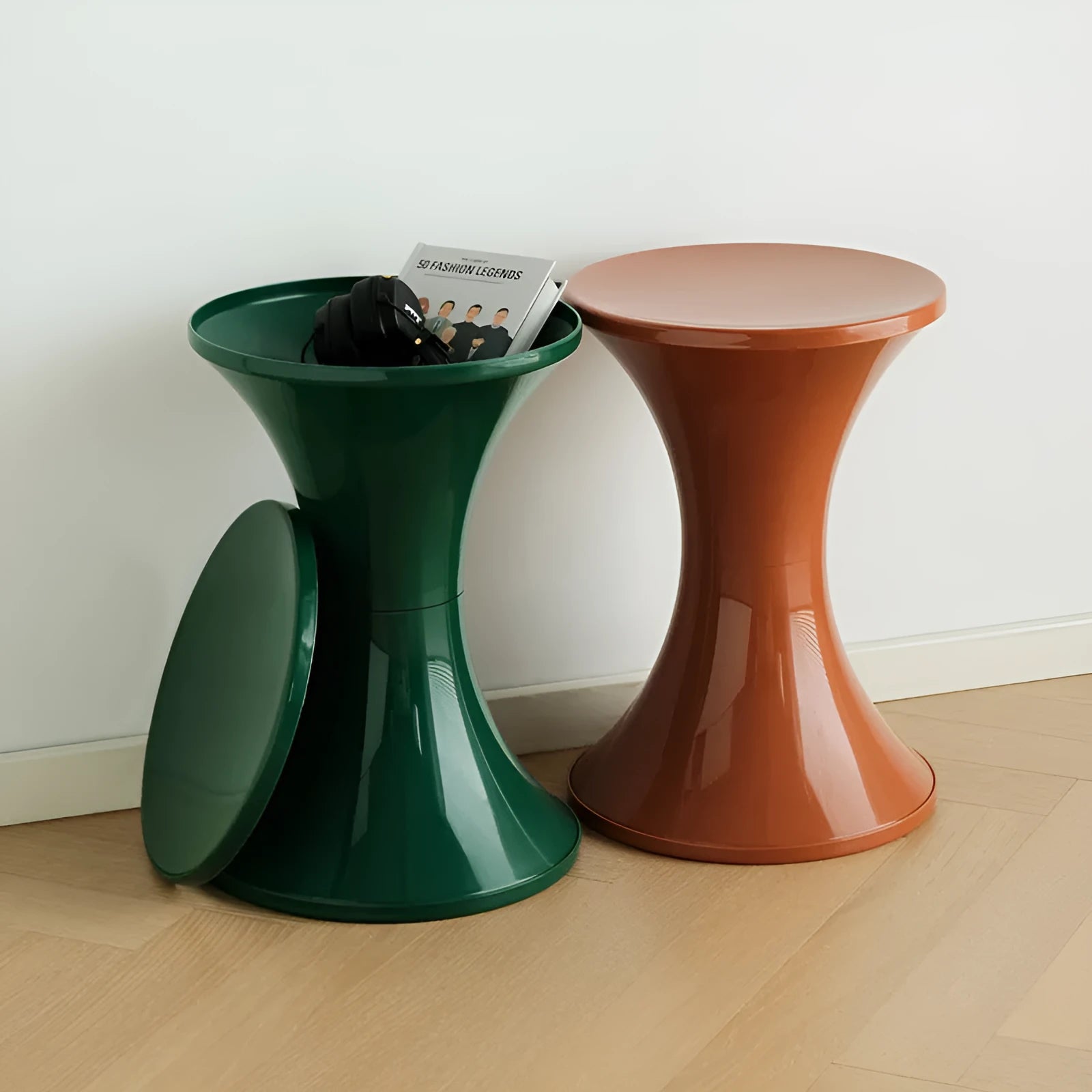 A plastic hourglass-shaped shoe changing stool in one of five colour options.