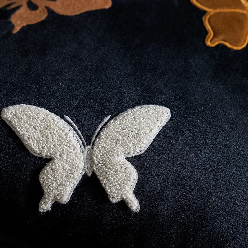 Square cushion with Chinese style butterfly embroidery in beige, black, and purple colours