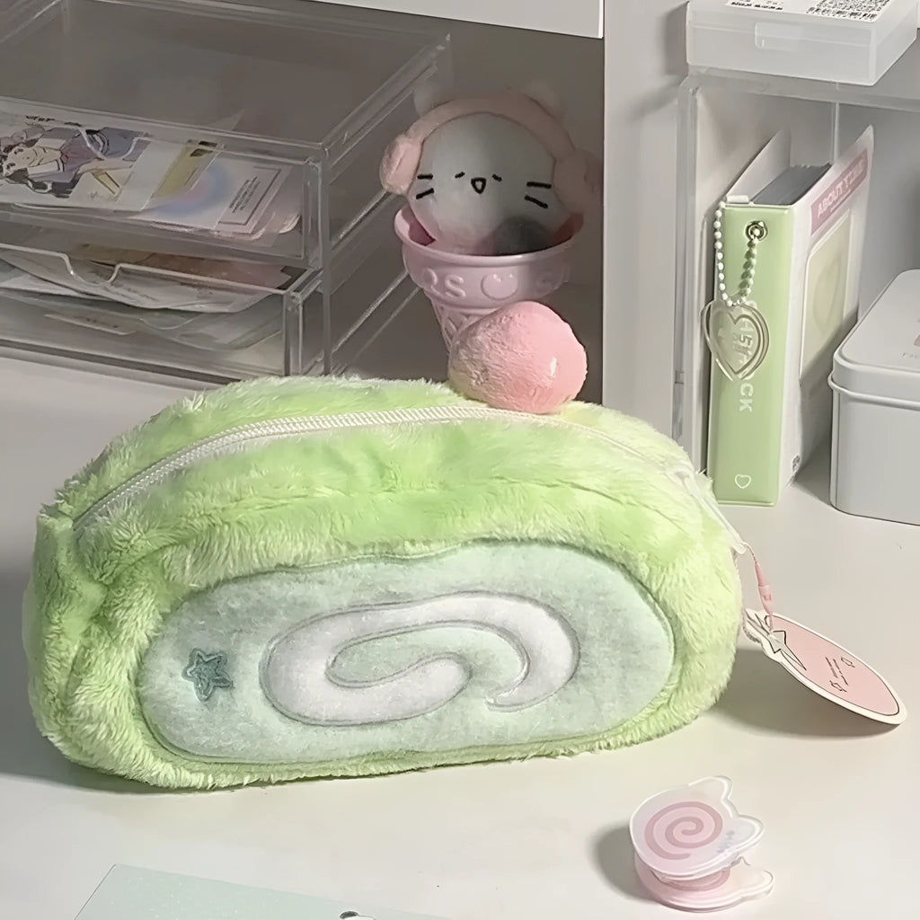 Honeydew roll plush velvet pencil case with Swiss roll cake design in beige, brown, and cream colours