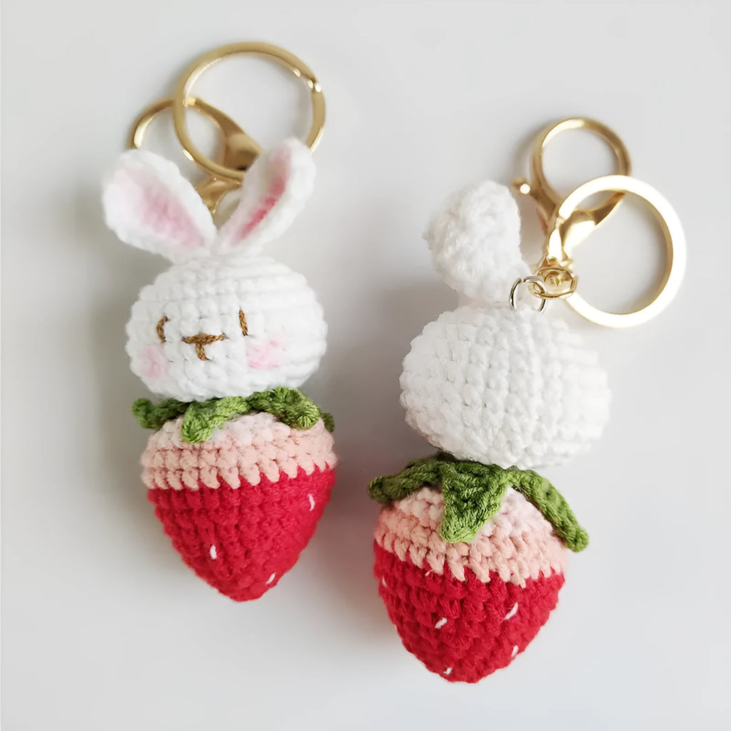 Hand-woven rabbit pendant with strawberry pattern made from four-strand wire with key attachment