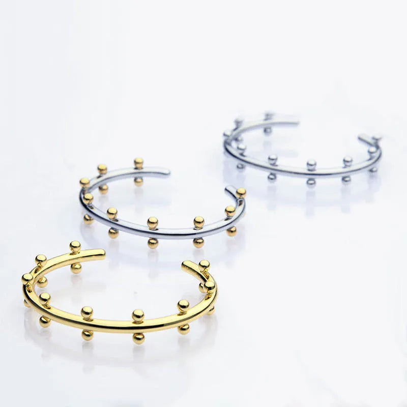 Stainless steel C-shaped bean bead with textured rivet design for jewellery making