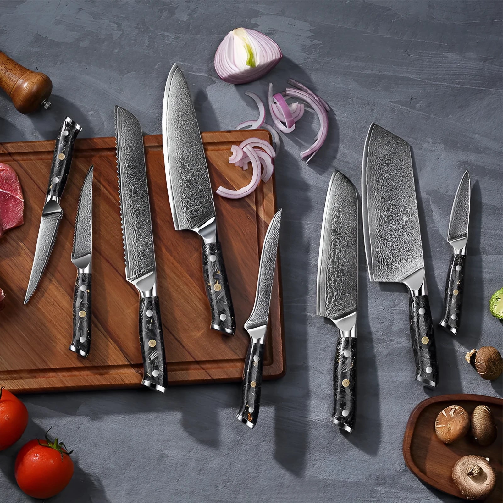 Eight-piece Damascus style kitchen knife set with fishbone pattern and steel core including fruit steak and chef knives