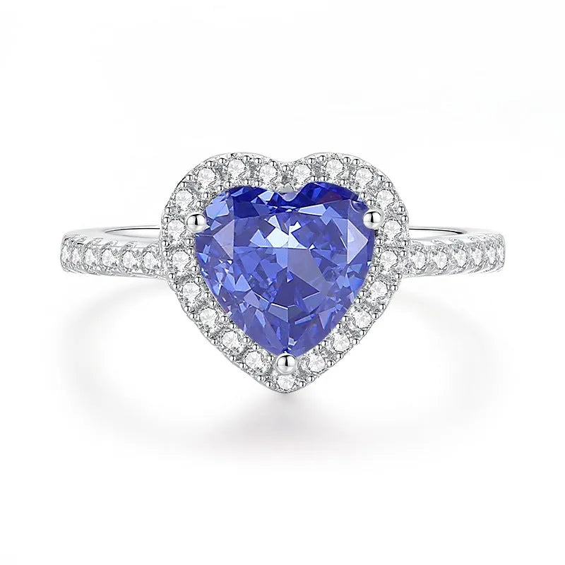 Heart-shaped high carbon diamond-cut ice flower zircon stone in a women's 925 sterling silver ring.