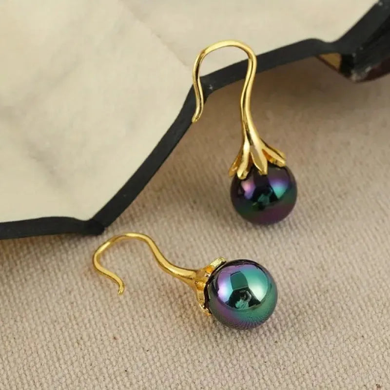Gold electroplated retro fashion women's earrings with alloy construction