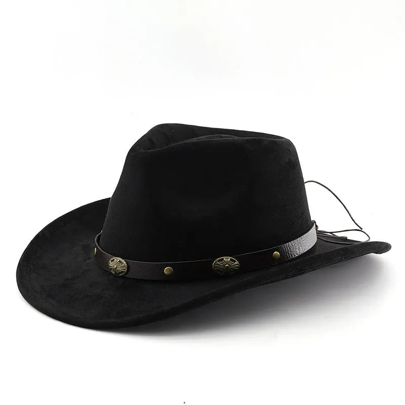 Brown leather cowboy hat with curved brim and conical crown on wooden surface
