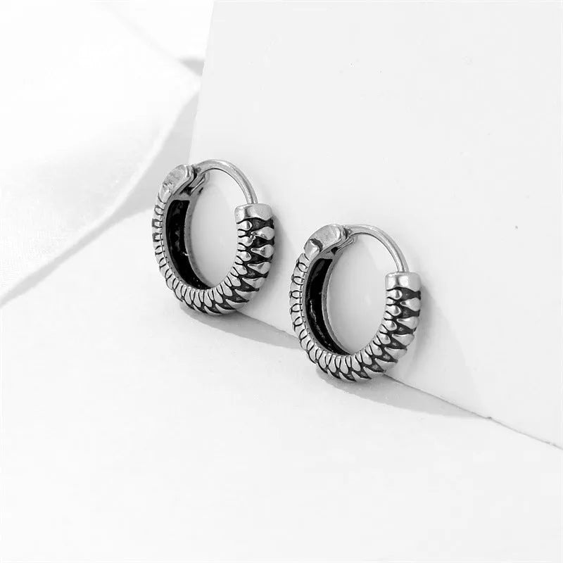 Silver geometric earrings with retro twist design and titanium steel construction