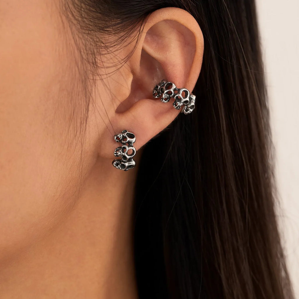 Stainless steel hollow skull ear clip earrings with geometric shape and retro hip hop style